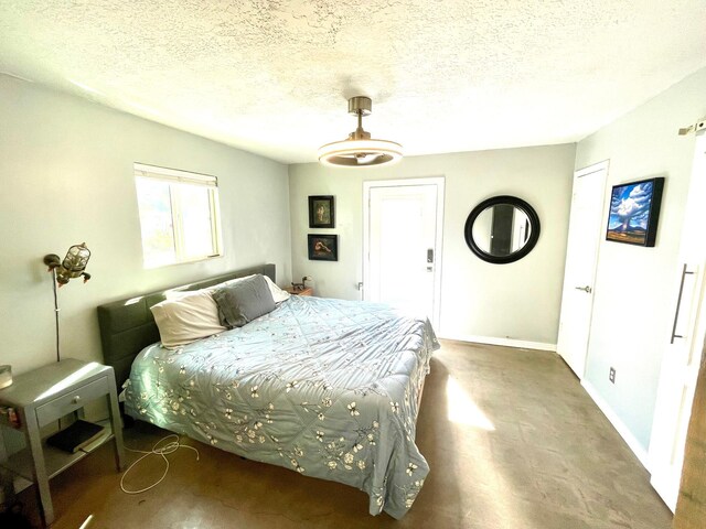 201 Marlowe Ln, Albuquerque, NM 87113 - bedroom featuring a textured ceiling