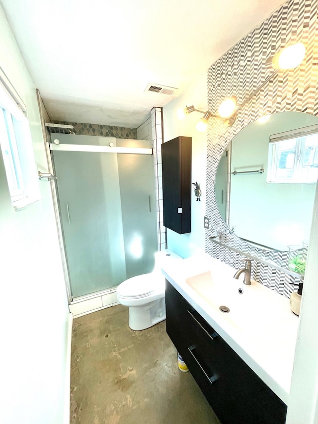 201 Marlowe Ln, Albuquerque, NM 87113 - full bathroom with vanity, a shower stall, unfinished concrete flooring, and baseboard heating