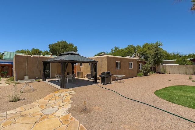 201 Marlowe Ln, Albuquerque, NM 87113 - rear view of property featuring a gazebo, a patio area, and stucco siding