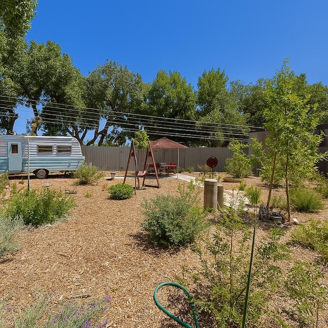 201 Marlowe Ln, Albuquerque, NM 87113 - fenced backyard with a playground