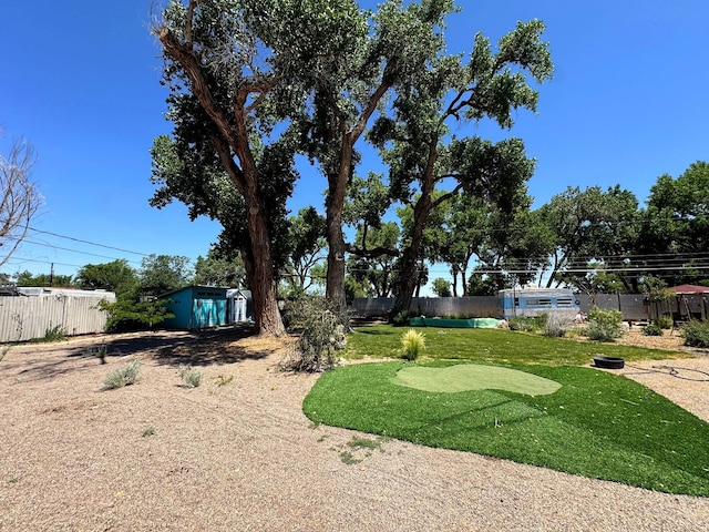 201 Marlowe Ln, Albuquerque, NM 87113 - view of yard featuring a putting area and an outdoor structure