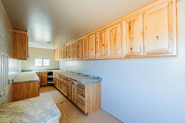 215 Tren Rd, Los Lunas, NM 87031 - kitchen featuring built in study area