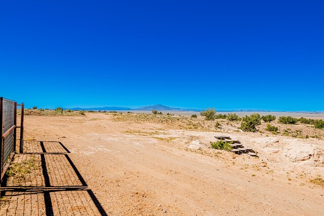215 Tren Rd, Los Lunas, NM 87031 - water view with a desert landscape and a mountainous background