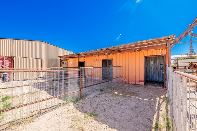 215 Tren Rd, Los Lunas, NM 87031 - view of front of property with an exterior structure and an outbuilding