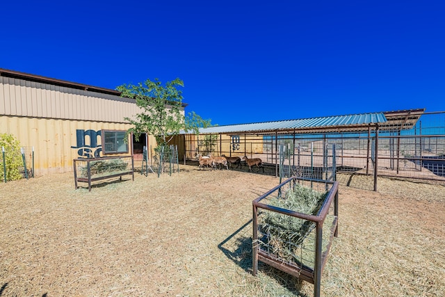 215 Tren Rd, Los Lunas, NM 87031 - surrounding community featuring an exterior structure and an outdoor structure