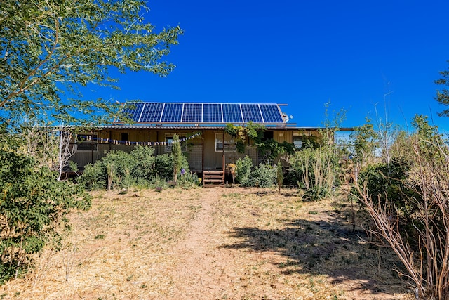 215 Tren Rd, Los Lunas, NM 87031 - back of property with roof mounted solar panels