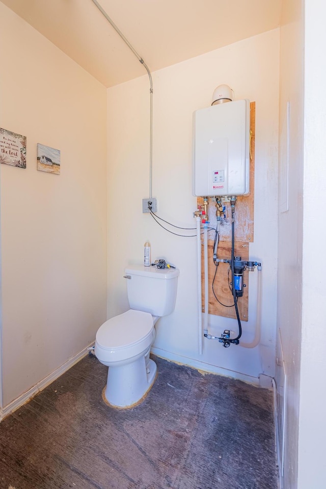 215 Tren Rd, Los Lunas, NM 87031 - bathroom with toilet and tankless water heater