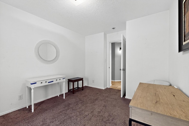 10409 Red Robin Rd SW, Albuquerque, NM 87121 - carpeted office space featuring a textured ceiling and baseboards