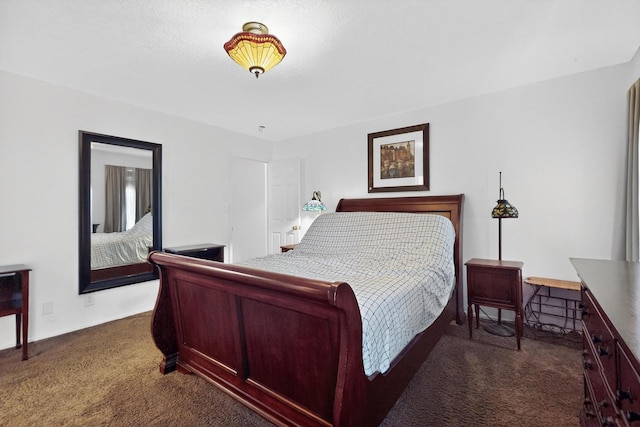10409 Red Robin Rd SW, Albuquerque, NM 87121 - bedroom featuring dark carpet