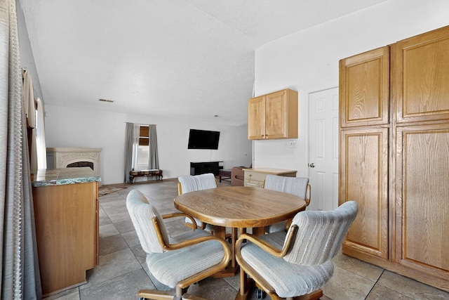 10409 Red Robin Rd SW, Albuquerque, NM 87121 - dining area with a fireplace