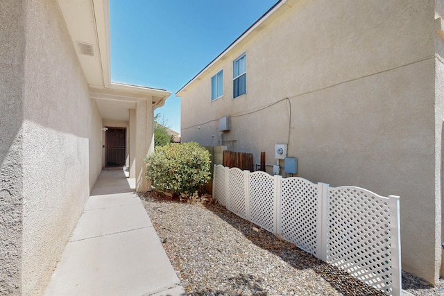 10409 Red Robin Rd SW, Albuquerque, NM 87121 - view of side of property featuring stucco siding