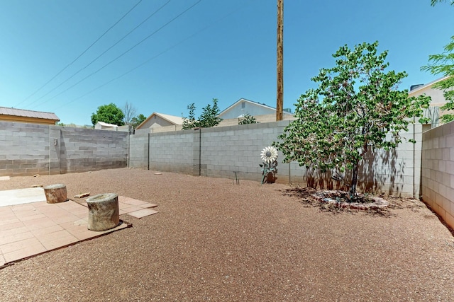 10409 Red Robin Rd SW, Albuquerque, NM 87121 - fenced backyard featuring a patio