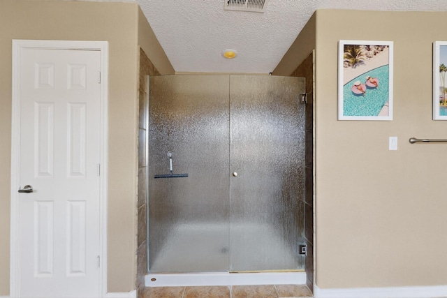 4420 Bentgrass Mdws NE, Rio Rancho, NM 87144 - bathroom featuring a shower stall and a textured ceiling