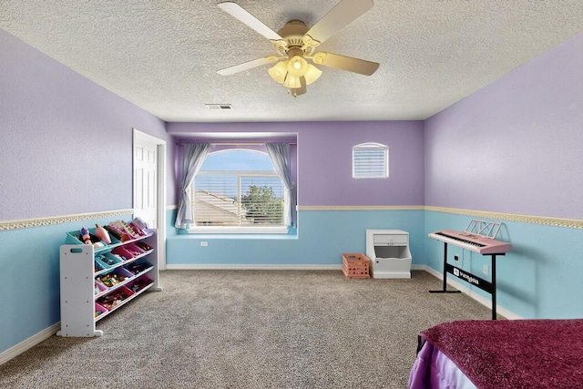 4420 Bentgrass Mdws NE, Rio Rancho, NM 87144 - bedroom featuring a textured ceiling, carpet flooring, and ceiling fan