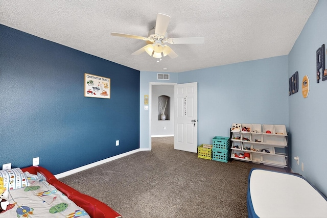4420 Bentgrass Mdws NE, Rio Rancho, NM 87144 - bedroom featuring carpet floors, a textured ceiling, and a ceiling fan