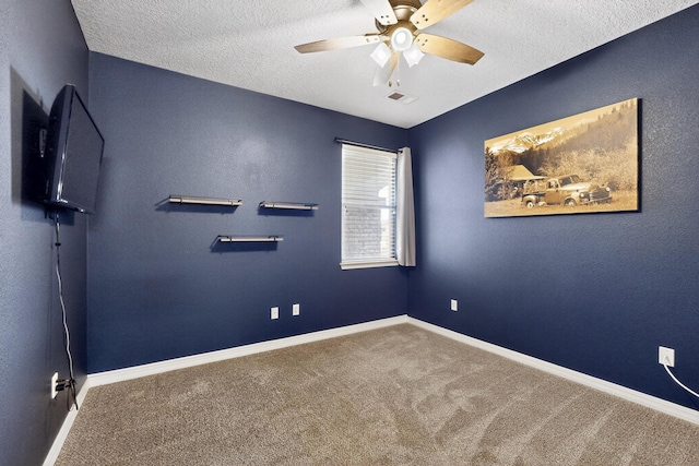 4420 Bentgrass Mdws NE, Rio Rancho, NM 87144 - carpeted spare room featuring a ceiling fan and a textured ceiling