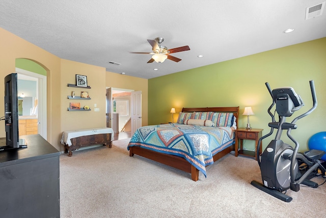 5808 Mariola Pl NE, Albuquerque, NM 87111 - carpeted bedroom with arched walkways, a ceiling fan, and recessed lighting