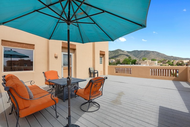 5808 Mariola Pl NE, Albuquerque, NM 87111 - deck with a mountain view and outdoor dining area