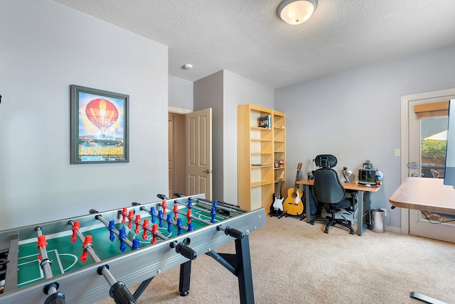 5808 Mariola Pl NE, Albuquerque, NM 87111 - game room featuring carpet flooring, a textured ceiling, and a desk