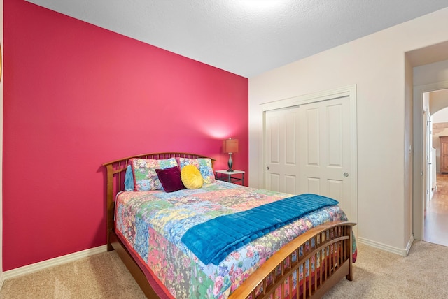 5808 Mariola Pl NE, Albuquerque, NM 87111 - bedroom with carpet floors and a closet