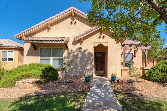 851 Vista Patron Dr, Bernalillo, NM 87004 - view of front of home with stucco siding and a tiled roof