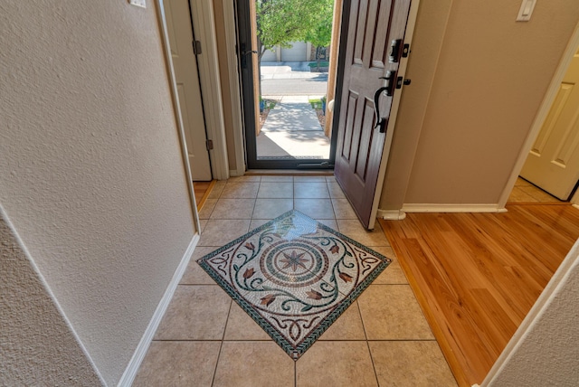 851 Vista Patron Dr, Bernalillo, NM 87004 - entryway with a textured wall and light tile patterned flooring