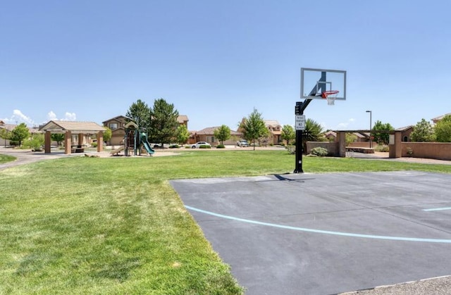 851 Vista Patron Dr, Bernalillo, NM 87004 - view of basketball court featuring a gazebo, basketball hoop, a lawn, and a playground