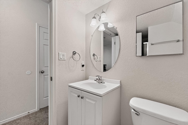 8905 Balsam Glade Rd NW, Albuquerque, NM 87114 - bathroom with vanity and a textured wall