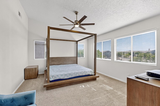 8905 Balsam Glade Rd NW, Albuquerque, NM 87114 - carpeted bedroom with a textured ceiling, a ceiling fan, and lofted ceiling