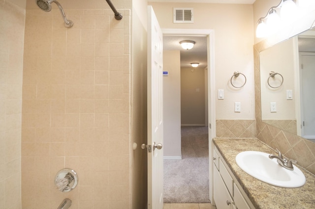 12910 Alice Ave NE, Albuquerque, NM 87112 - bathroom featuring vanity and  shower combination