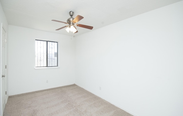 12910 Alice Ave NE, Albuquerque, NM 87112 - empty room with light colored carpet and ceiling fan