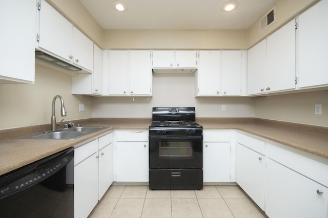 12910 Alice Ave NE, Albuquerque, NM 87112 - kitchen featuring black appliances, light tile patterned floors, white cabinets, recessed lighting, and under cabinet range hood