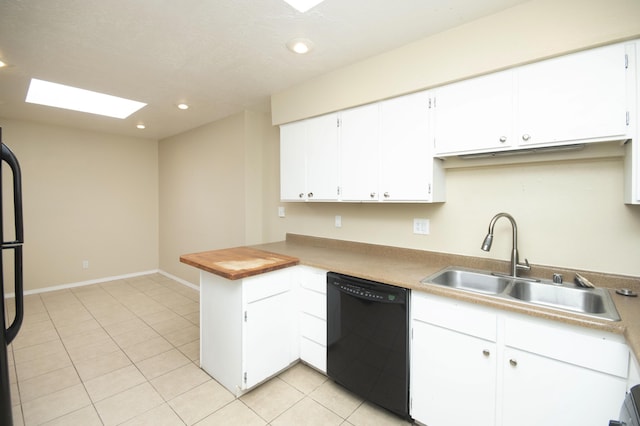12910 Alice Ave NE, Albuquerque, NM 87112 - kitchen with dishwasher, a skylight, a peninsula, white cabinetry, and recessed lighting