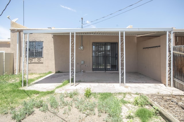 12910 Alice Ave NE, Albuquerque, NM 87112 - rear view of property featuring stucco siding