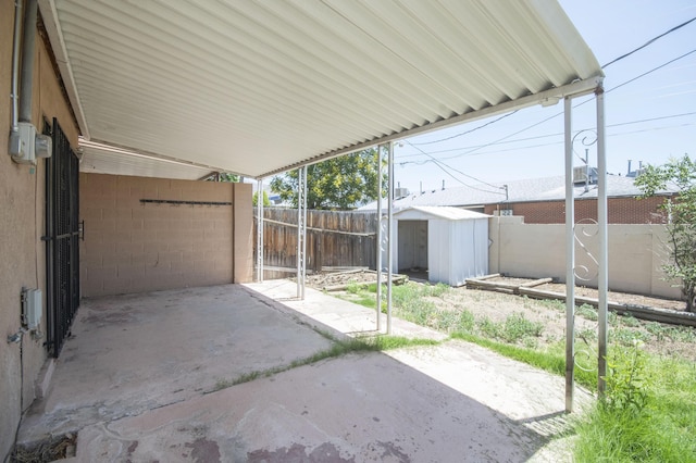 12910 Alice Ave NE, Albuquerque, NM 87112 - fenced backyard with a patio and a shed