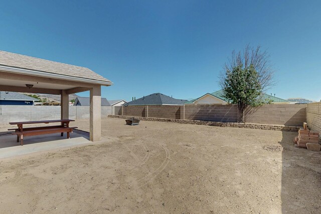 2062 Valley View Dr SW, Los Lunas, NM 87031 - fenced backyard featuring a patio