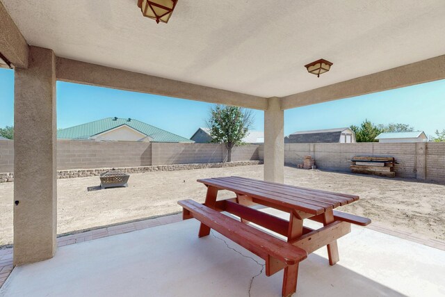 2062 Valley View Dr SW, Los Lunas, NM 87031 - fenced backyard featuring a patio