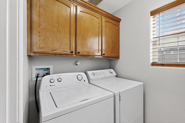 2062 Valley View Dr SW, Los Lunas, NM 87031 - laundry area with cabinet space and independent washer and dryer
