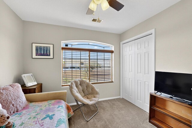 2062 Valley View Dr SW, Los Lunas, NM 87031 - carpeted bedroom featuring a closet and a ceiling fan