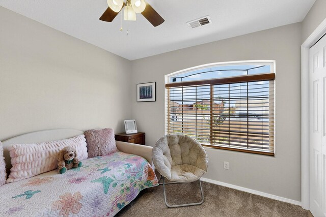 2062 Valley View Dr SW, Los Lunas, NM 87031 - carpeted bedroom featuring multiple windows and a ceiling fan