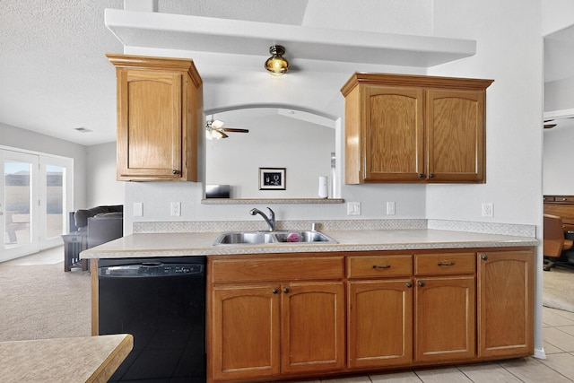 2062 Valley View Dr SW, Los Lunas, NM 87031 - kitchen with black dishwasher, light countertops, and ceiling fan