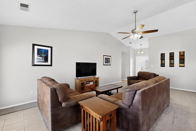 2062 Valley View Dr SW, Los Lunas, NM 87031 - living room with vaulted ceiling, a ceiling fan, and light carpet