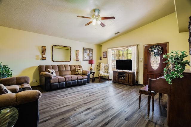 5131 Gaviota NW, Albuquerque, NM 87120 - living room featuring a ceiling fan, vaulted ceiling, and wood finished floors
