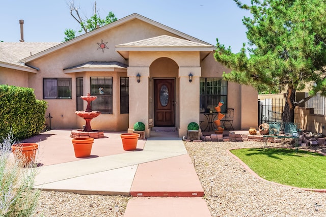 5131 Gaviota NW, Albuquerque, NM 87120 - mediterranean / spanish home with stucco siding and roof with shingles
