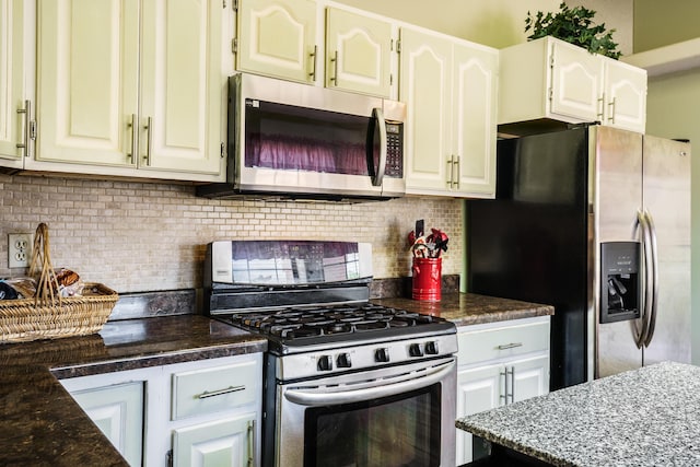 5131 Gaviota NW, Albuquerque, NM 87120 - kitchen with stainless steel appliances and tasteful backsplash