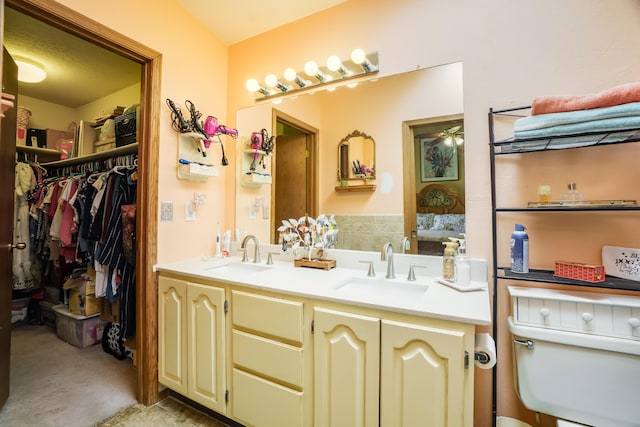 5131 Gaviota NW, Albuquerque, NM 87120 - bathroom with double vanity and ceiling fan