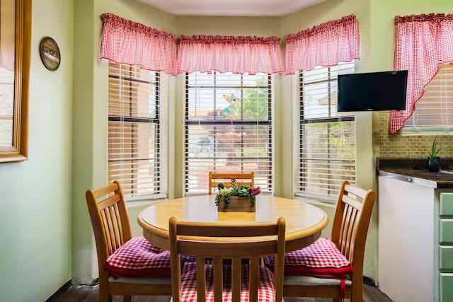 5131 Gaviota NW, Albuquerque, NM 87120 - dining space featuring healthy amount of natural light and wood finished floors