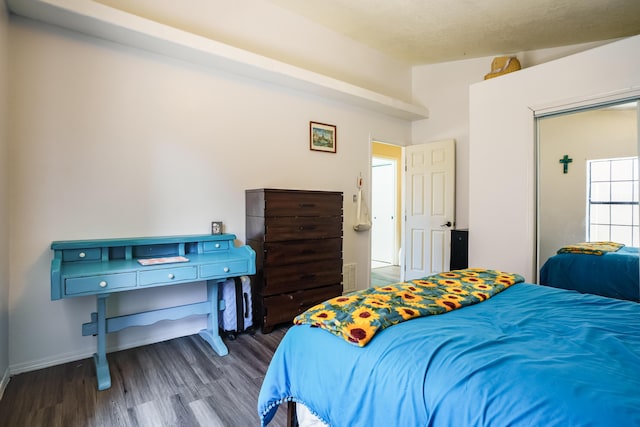 5131 Gaviota NW, Albuquerque, NM 87120 - bedroom featuring wood finished floors and lofted ceiling