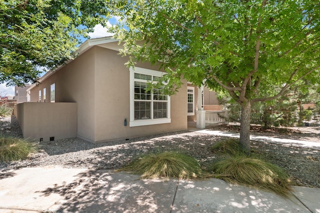5723 Strand Loop SE, Albuquerque, NM 87106 - view of side of property featuring stucco siding