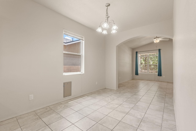 5723 Strand Loop SE, Albuquerque, NM 87106 - unfurnished room featuring arched walkways, a ceiling fan, a chandelier, and lofted ceiling